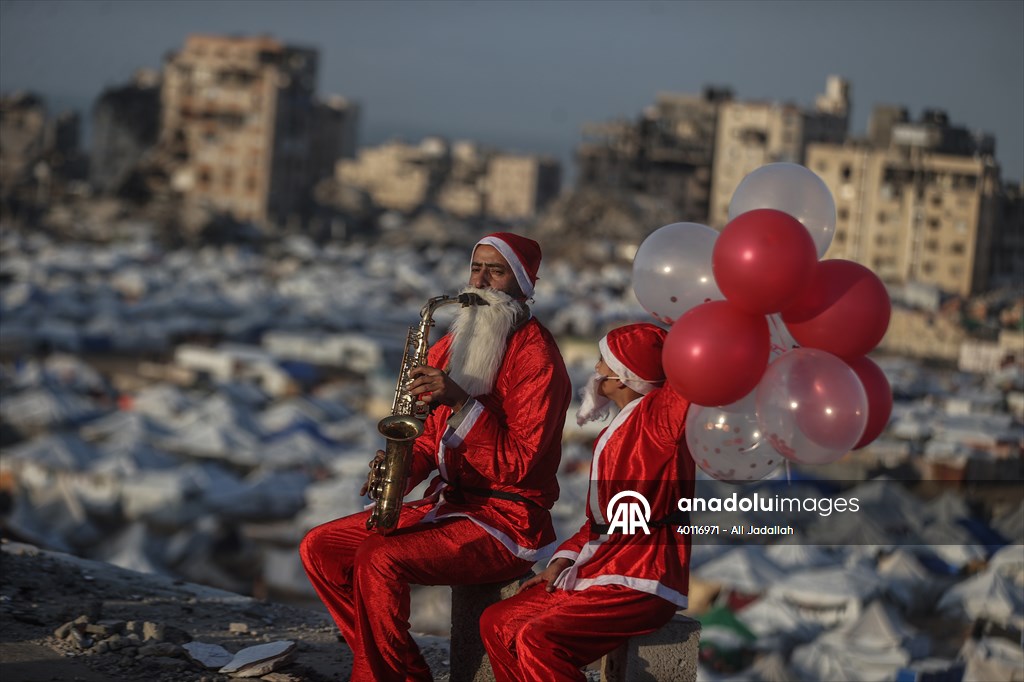 Volunteers dressed as Santa bring joy to children in Gaza
