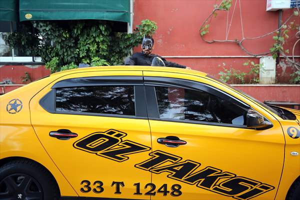 "Batman" costumed taxi driver in Turkey's Mersin