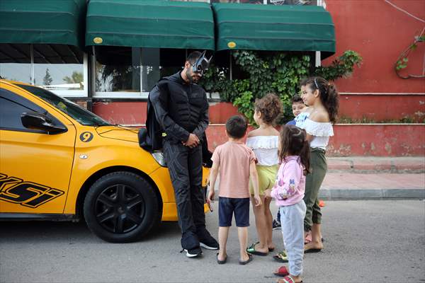 "Batman" costumed taxi driver in Turkey's Mersin