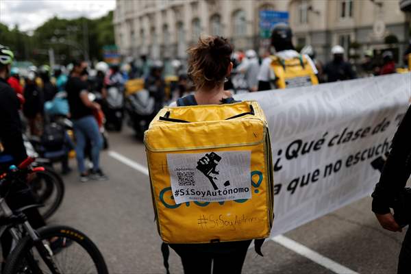 Riders protest against new law that regulates delivery riders