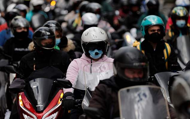 Riders protest against new law that regulates delivery riders