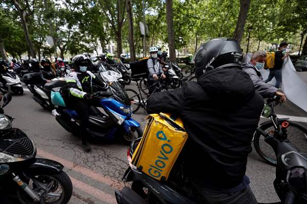 Riders protest against new law that regulates delivery riders