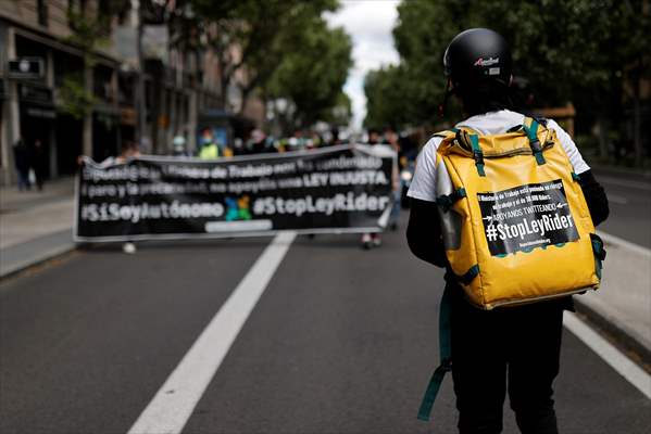 Riders protest against new law that regulates delivery riders