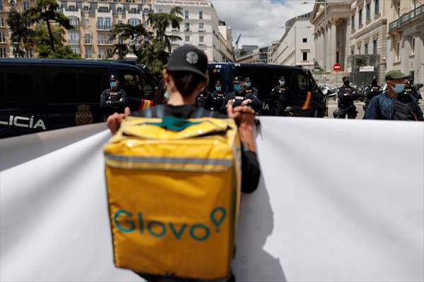 Riders protest against new law that regulates delivery riders