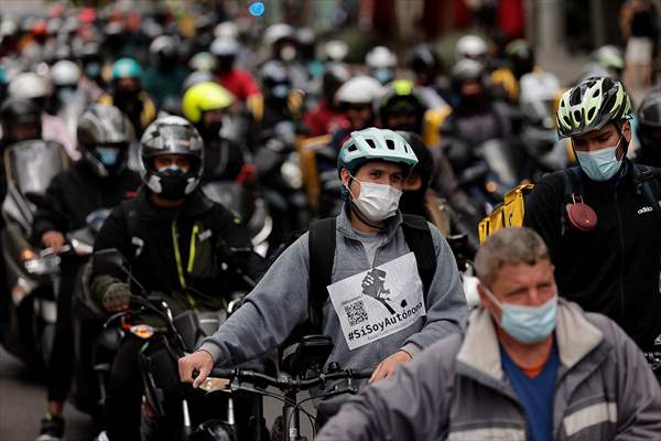 Riders protest against new law that regulates delivery riders