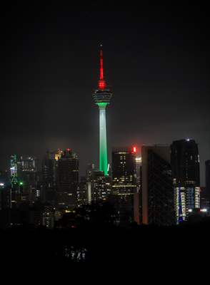 KL Tower illuminated with Palestinian flag's colors to show solidarity