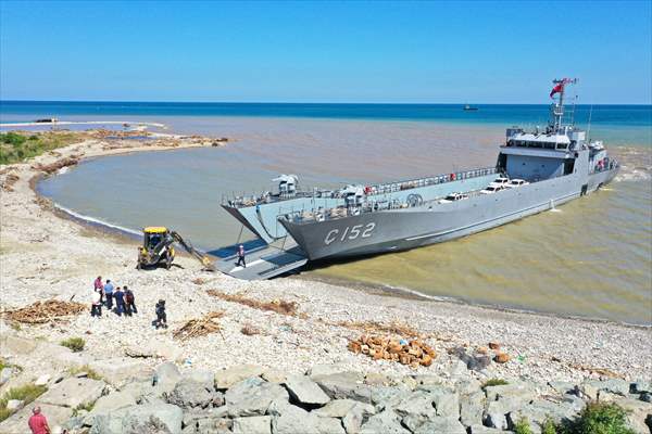 Landing ships carry heavy machines to Sinop's flood hit Turkeli district