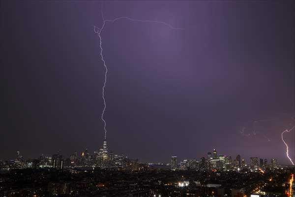 Lightning strikes over the Freedom Tower in NYC