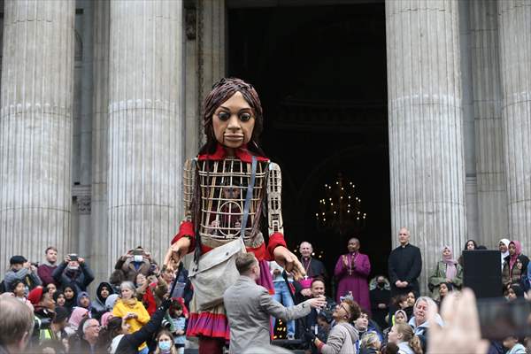 Little Amal, symbol of child refugees, reaches London