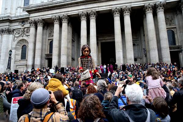 Little Amal, symbol of child refugees, reaches London