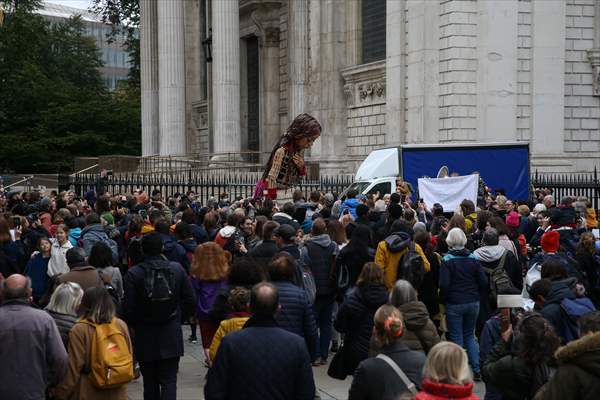 Little Amal, symbol of child refugees, reaches London
