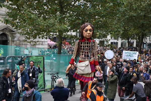 Little Amal, symbol of child refugees, reaches London