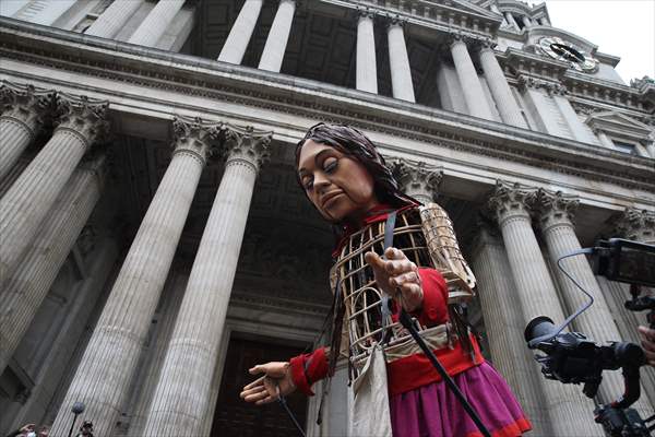 Little Amal, symbol of child refugees, reaches London