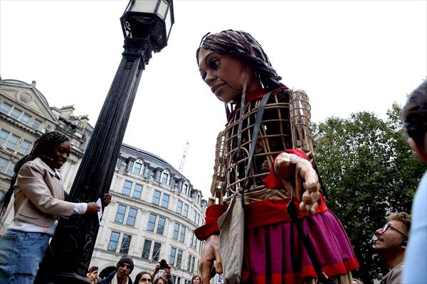 Little Amal, symbol of child refugees, reaches London