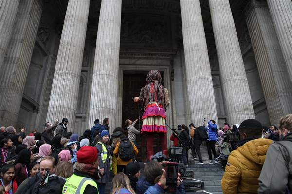 Little Amal, symbol of child refugees, reaches London