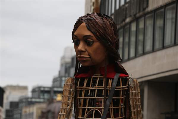 Little Amal, symbol of child refugees, reaches London