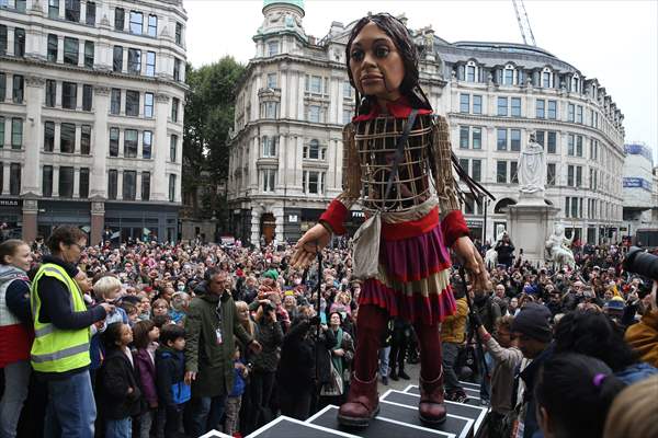Little Amal, symbol of child refugees, reaches London
