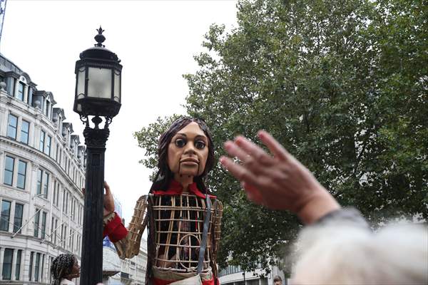 Little Amal, symbol of child refugees, reaches London
