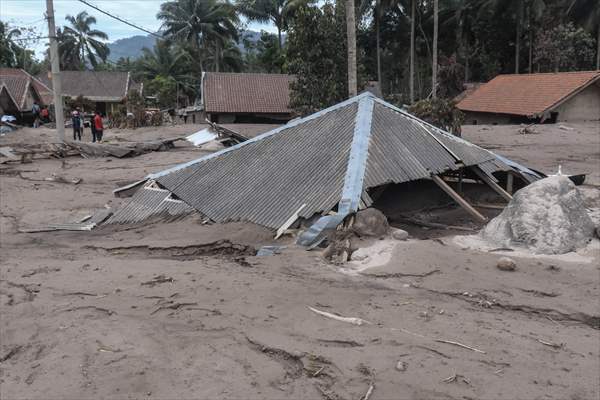 Houses damaged after Mount Semeru eruption in Indonesia