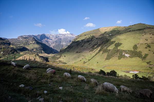 Tourists ascend to the hot springs lagoons of the Nevado del Rui