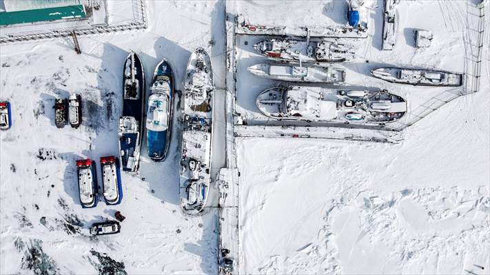 Boats and ships stranded on the frozen Lake Baikal