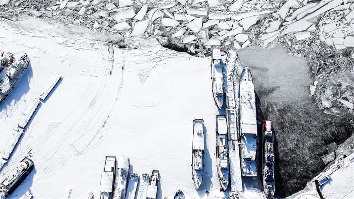 Boats and ships stranded on the frozen Lake Baikal