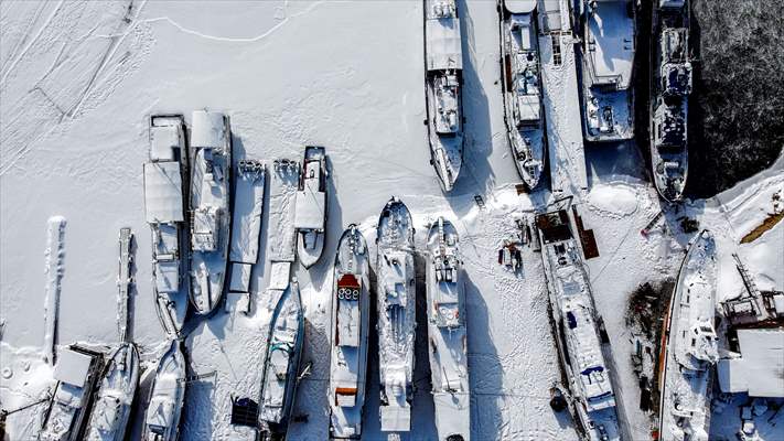 Boats and ships stranded on the frozen Lake Baikal