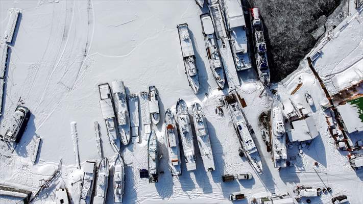 Boats and ships stranded on the frozen Lake Baikal