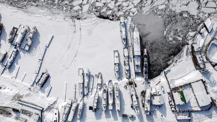 Boats and ships stranded on the frozen Lake Baikal