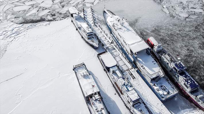 Boats and ships stranded on the frozen Lake Baikal