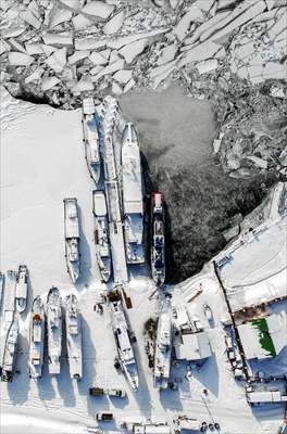 Boats and ships stranded on the frozen Lake Baikal