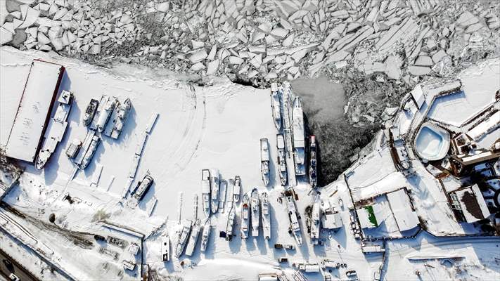 Boats and ships stranded on the frozen Lake Baikal