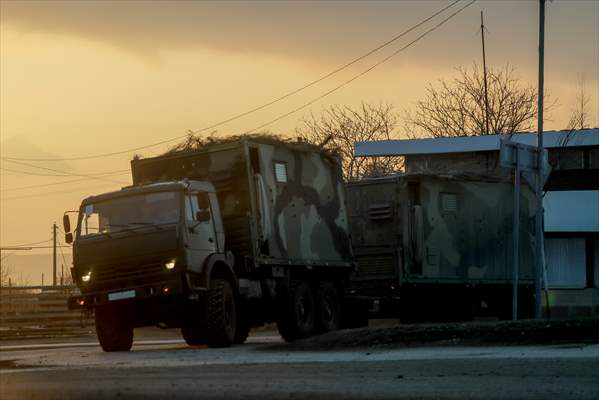A convoy of Russian military vehicles moving towards border in Donbas region