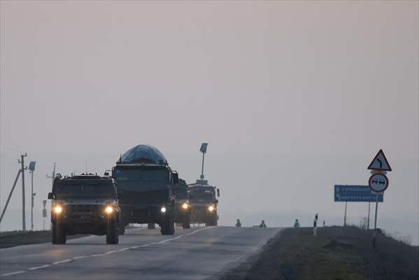 A convoy of Russian military vehicles moving towards border in Donbas region