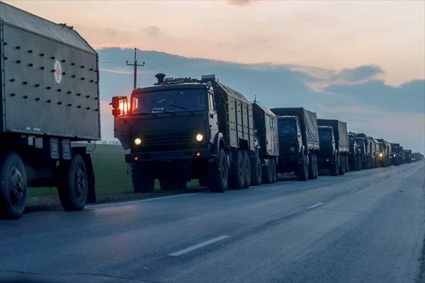 A convoy of Russian military vehicles moving towards border in Donbas region