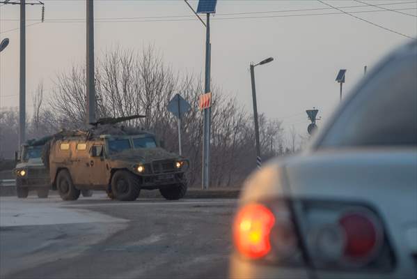 A convoy of Russian military vehicles moving towards border in Donbas region