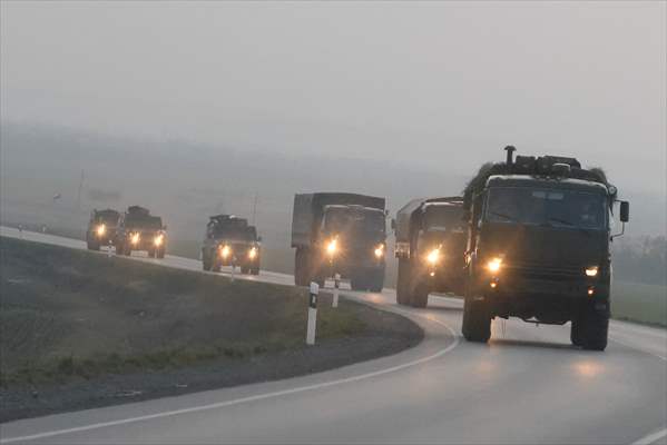 A convoy of Russian military vehicles moving towards border in Donbas region