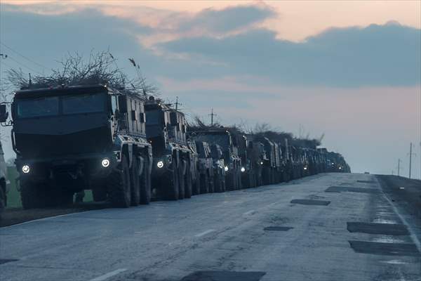 A convoy of Russian military vehicles moving towards border in Donbas region