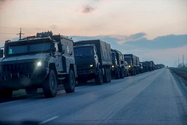 A convoy of Russian military vehicles moving towards border in Donbas region