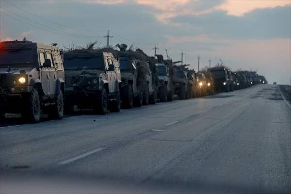 A convoy of Russian military vehicles moving towards border in Donbas region