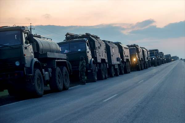 A convoy of Russian military vehicles moving towards border in Donbas region