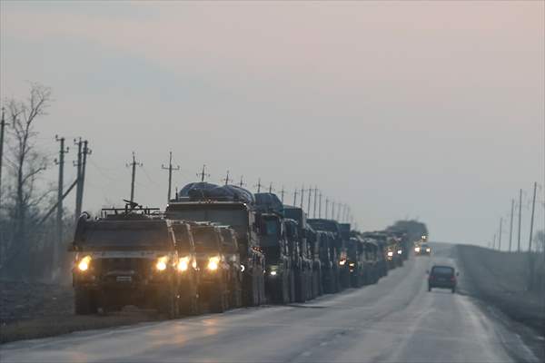 A convoy of Russian military vehicles moving towards border in Donbas region