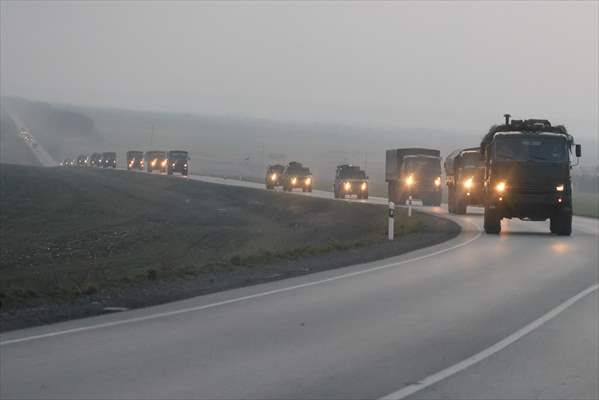 A convoy of Russian military vehicles moving towards border in Donbas region