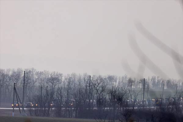 A convoy of Russian military vehicles moving towards border in Donbas region