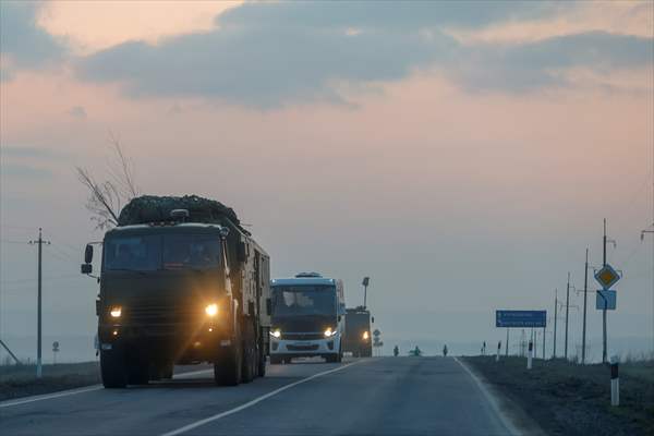 A convoy of Russian military vehicles moving towards border in Donbas region