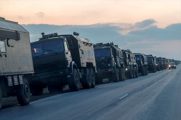 A convoy of Russian military vehicles moving towards border in Donbas region