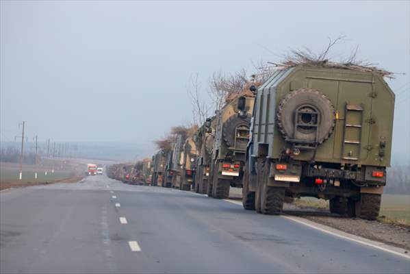 A convoy of Russian military vehicles moving towards border in Donbas region