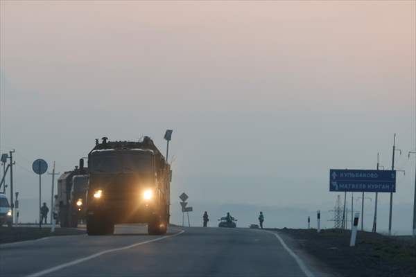 A convoy of Russian military vehicles moving towards border in Donbas region