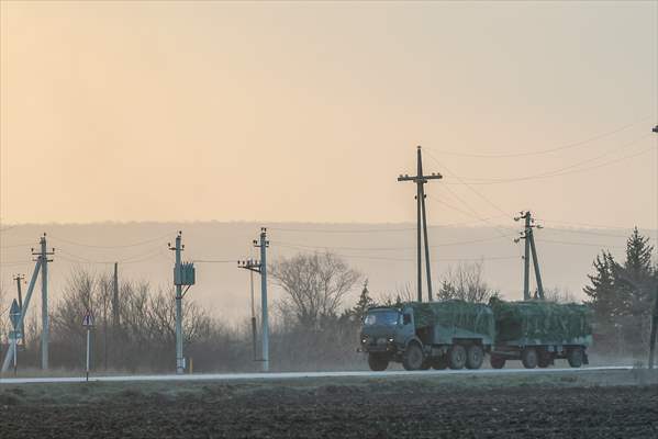 A convoy of Russian military vehicles moving towards border in Donbas region