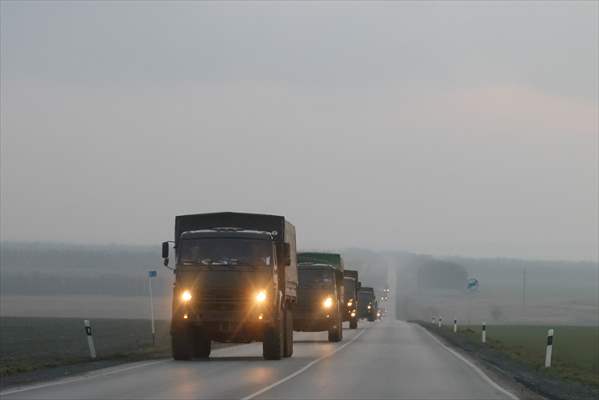 A convoy of Russian military vehicles moving towards border in Donbas region